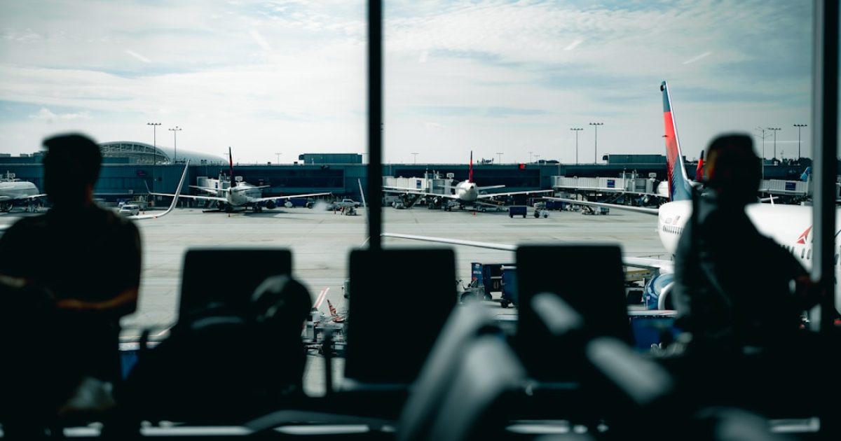 Airline ticket and passport at an airport