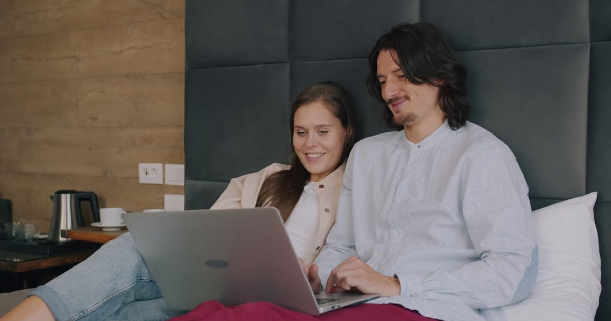 Booking a hotel reservation on a laptop