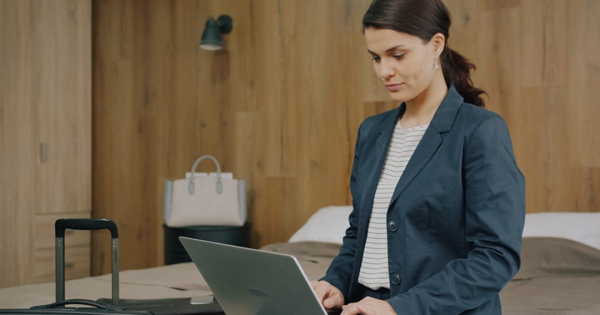 A neatly packed carry-on suitcase for business travel