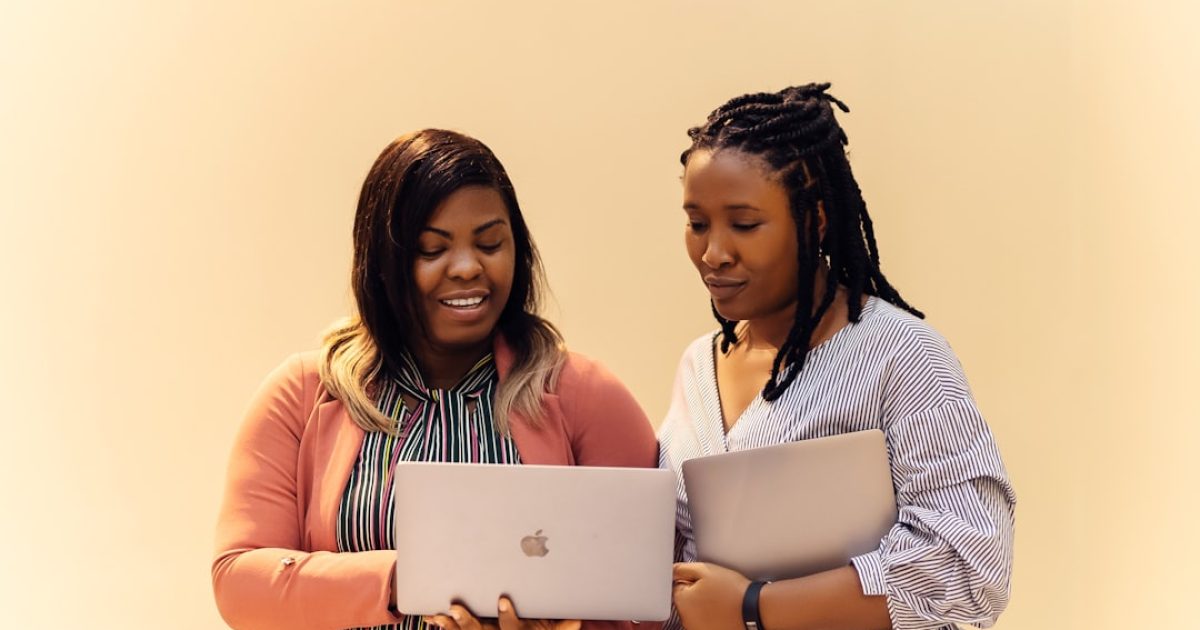Business team reviewing options on a laptop